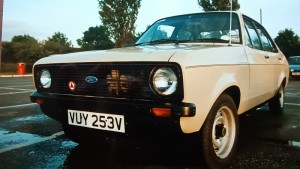 The trusty Escort. Beige and in poverty 'Popular Plus' specification.